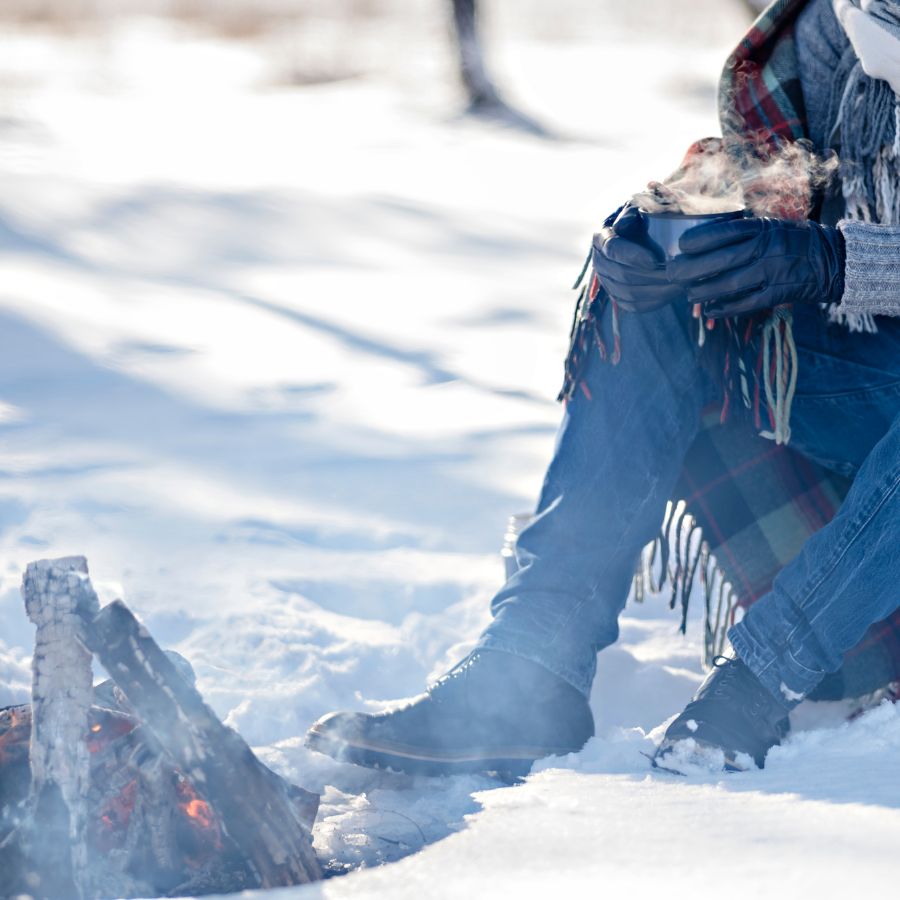 winter camping by the fire